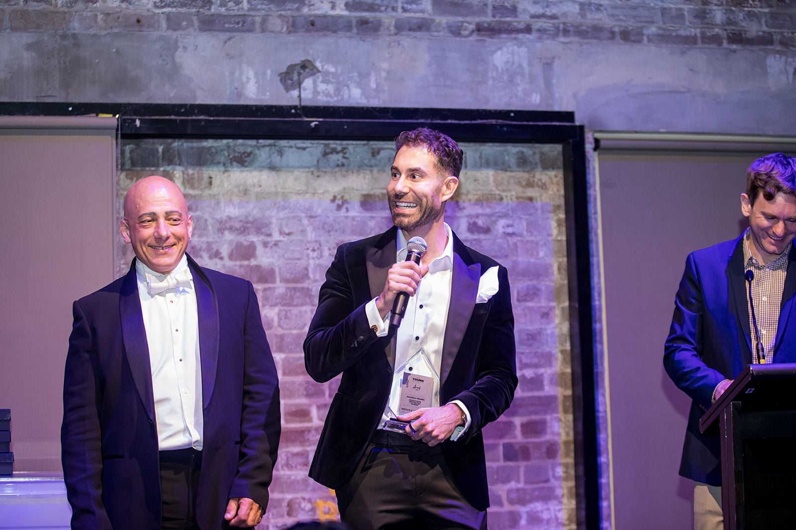 2025 Sydney Young Entrepreneur Awards Gala dinner Winners accepting trophies on stage at the 2025 Sydney Young Entrepreneur Awards